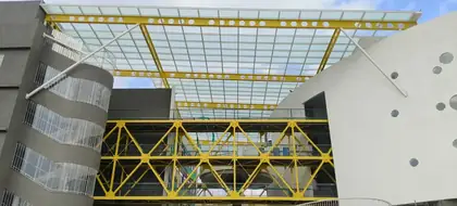 Steel truss bridge and glazed canopy