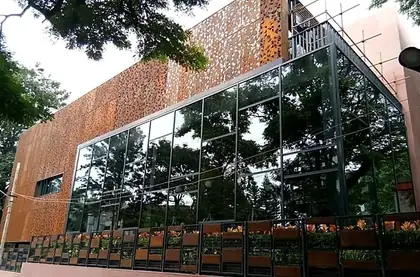 Corten screen over a glazed frontage