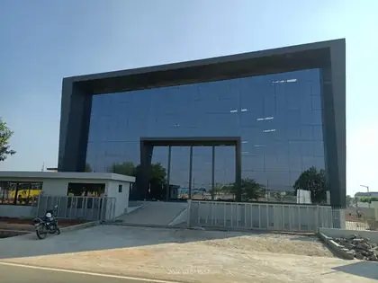 Glazed frontage with a steel portal